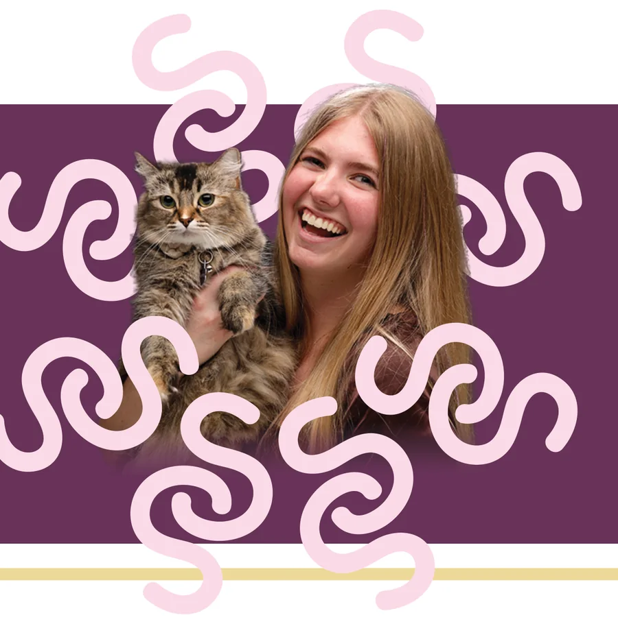Skye Tiedemann holding her cat
